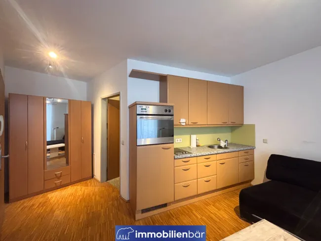 Praktische 1-Zimmerwohnung mit Balkon in zentraler Lage - Titelbild