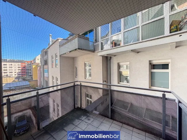 Praktische 1-Zimmerwohnung mit Balkon in zentraler Lage - Bild