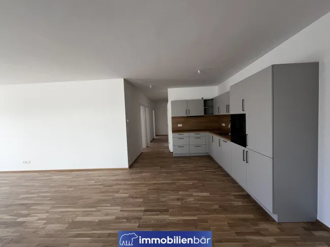 BEZUGSFERTIG - hochwertige 4 Zimmer Wohnung mit Garten - 2 Parkplätze - inkl. Küche - Top 3 - Bild