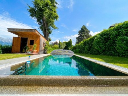 Gartenwohnung mit eigenem Pool in Innsbruck-Igls – 653 m² Privatgarten & Top-Lage
