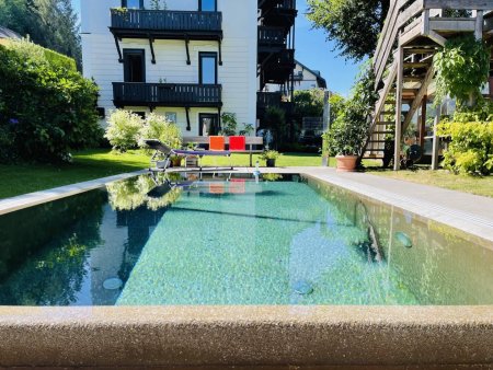 Gartenwohnung mit eigenem Pool in Innsbruck-Igls – 653 m² Privatgarten & Top-Lage
