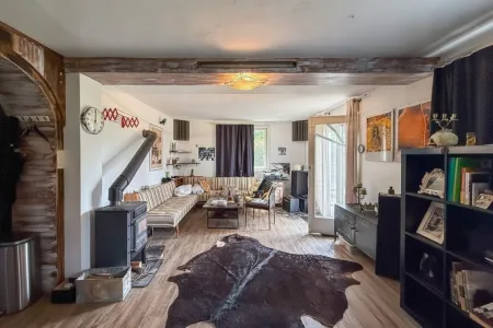Wohnzimmer mit Ausgang zur Terrasse