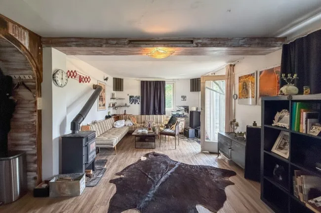 Wohnzimmer mit Ausgang zur Terrasse