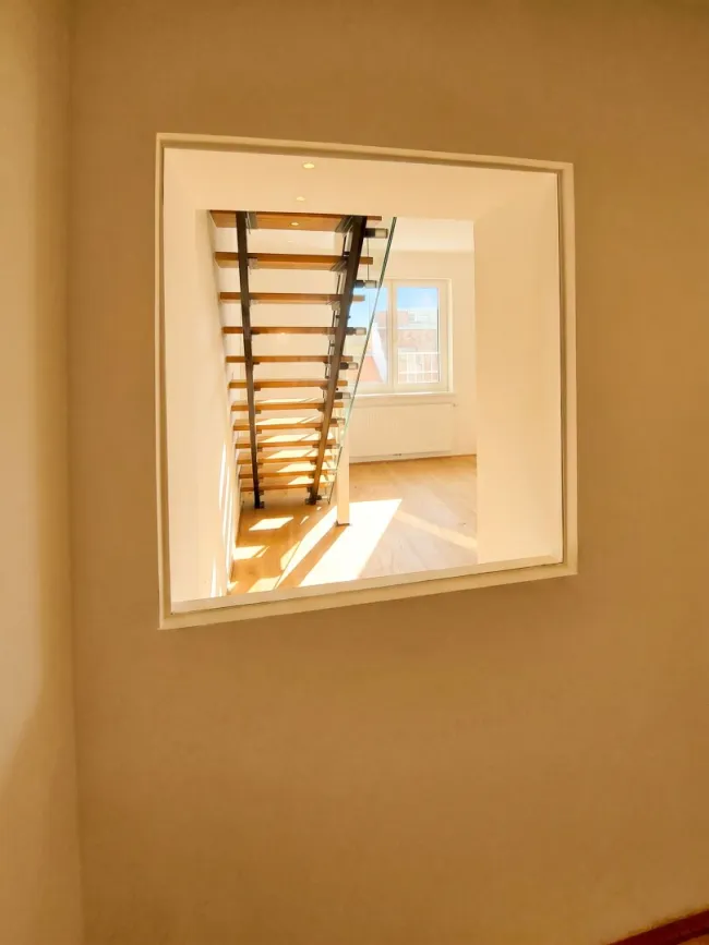Blick vom Vorraum ins Wohnzimmer