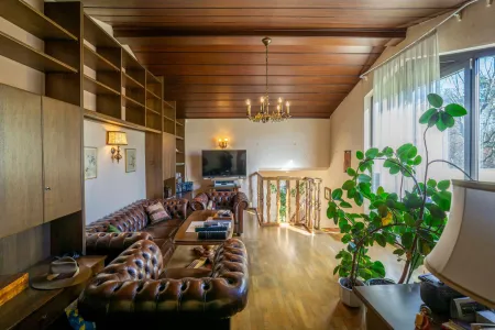 Zimmer mit Ausgang auf die Dachterrasse