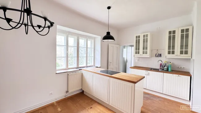 Lichtdurchflutet und großzügige Wohnung mit Garten in Breitenfurt | ZELLMANN IMMOBILIEN - Titelbild