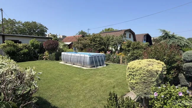 Kleingartenhaus im Eigentum in ruhiger Grünlage im Süden Wiens | ZELLMANN IMMOBILIEN - Titelbild