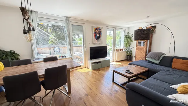 Mauer "Licht. Ruhe. Effizienz. Stilvolle Maisonette mit Südterrasse" | ZELLMANN IMMOBILIEN - Bild