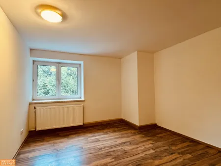 Charmante 3-Zimmer-Wohnung mit Eigengarten