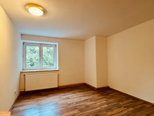 Charmante 3-Zimmer-Wohnung mit Eigengarten - Bild