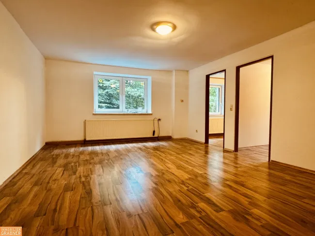 Charmante 3-Zimmer-Wohnung mit Eigengarten - Titelbild