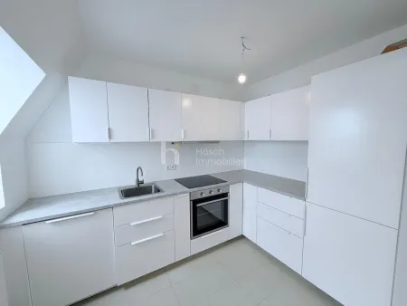 Helle Dachgeschosswohnung mit Charme und Ruhelage