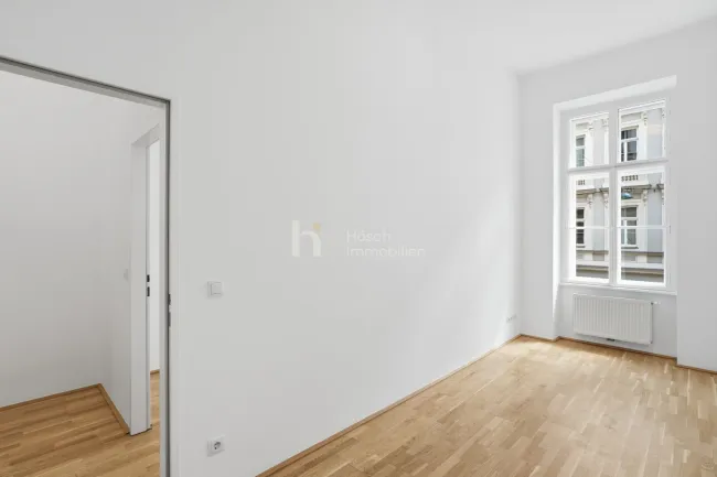 Klassische Wiener Eleganz – Renovierte Altbauwohnung mit besonderem Charakter im Volkertviertel - Bild