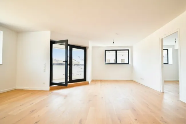 Exklusives Dachgeschoss-Domizil mit Loggia in urbaner Toplage - Titelbild
