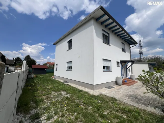 Großzügiges Einfamilienhaus mit Garten, Terrasse & Garage in Ebenfurth, 4 Zimmer, 195m² - Bild