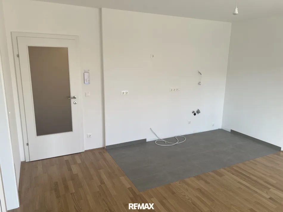 Idyllisches Wohnen in Wiener Neustadt: 2 Zimmer, Loggia, 54.04m² - 244.000,00€ - Bild