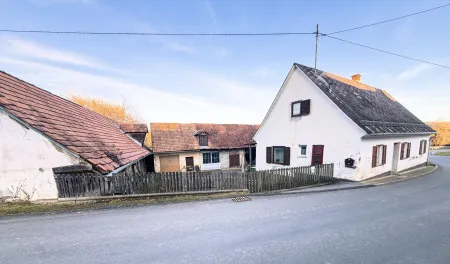 Einfamilienhaus mit Entwicklungspotenzial auf großzügigem Grundstück inklusive Landwirtschaftsflächen und Wald