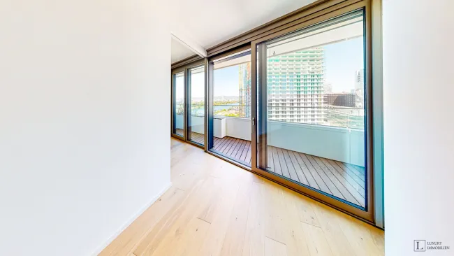 Stilvolle 2-Zimmer-Wohnung mit Balkon im DANUBEFLATS - Bild