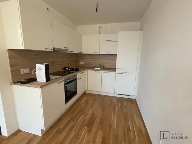 2-Zimmer-Wohnung & Tiefgaragenplatz incl., schöne Aussicht in begehrter Lage - Titelbild