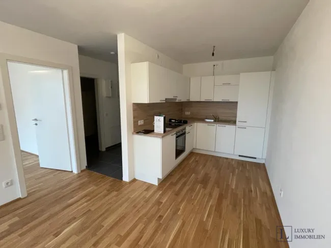 2-Zimmer-Wohnung & Tiefgaragenplatz incl., schöne Aussicht in begehrter Lage - Bild